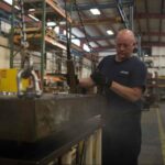 Polydeck employee in a plant