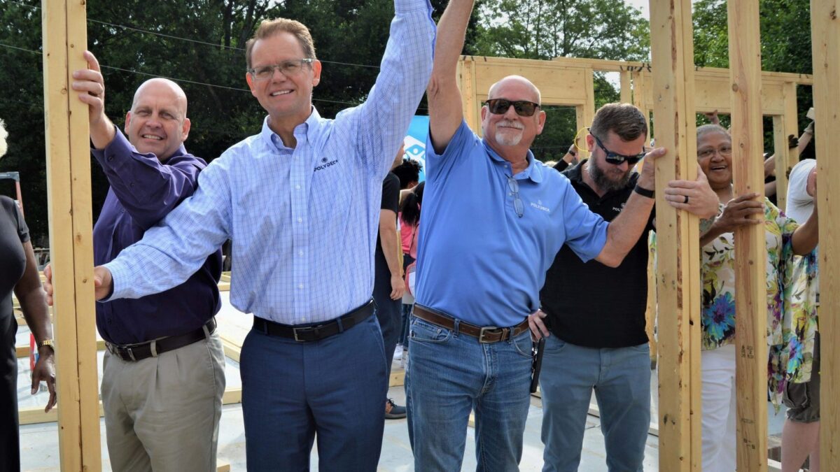 Polydeck's leadership at a volunteering event with Habitat for Humanity