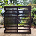 Recycled Screen Media in front of Waterfall